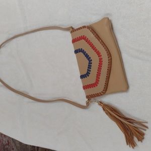 Cute crossbody bag 9 and 1/2 in wide 6 in depth Fringe detail